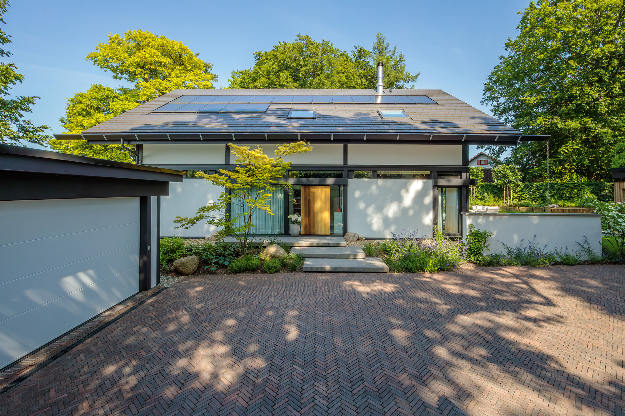 HUF Haus vereint Offenheit, Licht und zeitloses Design in moderner Architektur