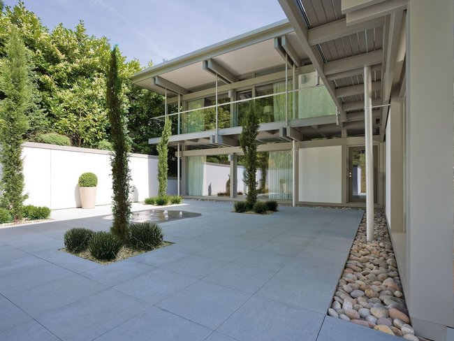 Modernes Flachdach Traumhaus mit klarem Design Exklusiver Lebensraum mit klaren Linien und hochwertiger Materialwahl