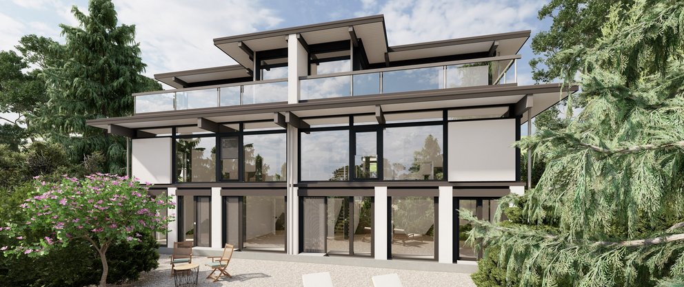 Ansicht eines Mehrfamilienhauses mit Garten und Terrasse