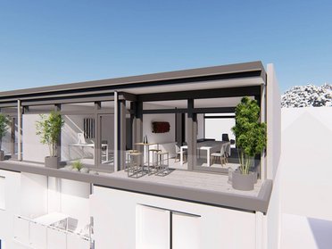 Moderne Architektur mit Terrasse und Pflanzen im Hintergrund