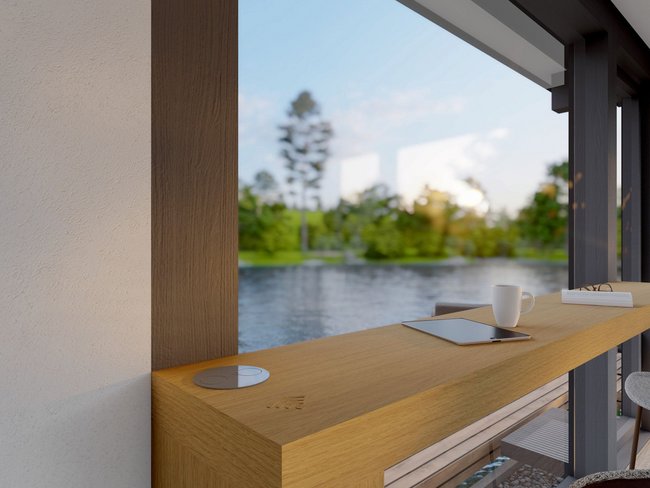 Moderne Architektur mit Aussicht auf Wasser Heller Raum mit Holzbar und Blick auf einen Garten und See
