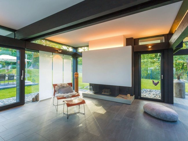 Gemütliches Familienhaus mit ausgewählten Möbeln und Designklassikern