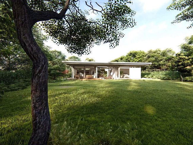 Modernes Atriumhaus inmitten einer grünen Landschaft