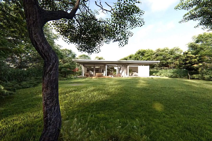 Modernes Atriumhaus inmitten einer grünen Landschaft