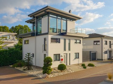 Haus mit HUF Aufstockung und Glasdach in ruhiger Wohngegend