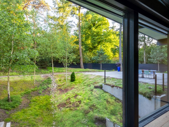 Modernes HUF Bungalow mit Aussicht ins Grüne Traumhaus mit Blick auf den Garten und moderne Architektur
