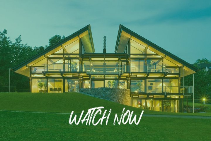 Jubiläumskalender 110 Jahre HUF HAUS Moderne Architektur des HUF HAUS bei Dämmerung