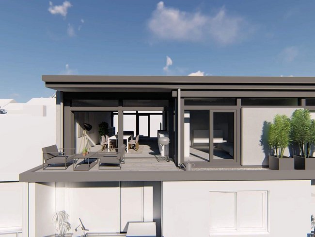 Moderne Aufstockung eines Hauses mit Terrasse und Ausblick