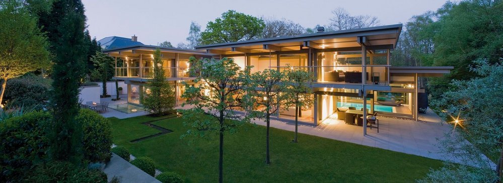 Modernes Flachdachtraumhaus in exklusivem Lebensraum Exklusive moderne Architektur mit klarem Design und hochwertigen Materialien