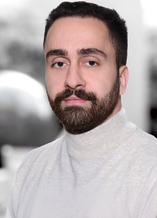 Portrait eines Mannes mit Bart in einem weißen Pullover Marko Jovanovic