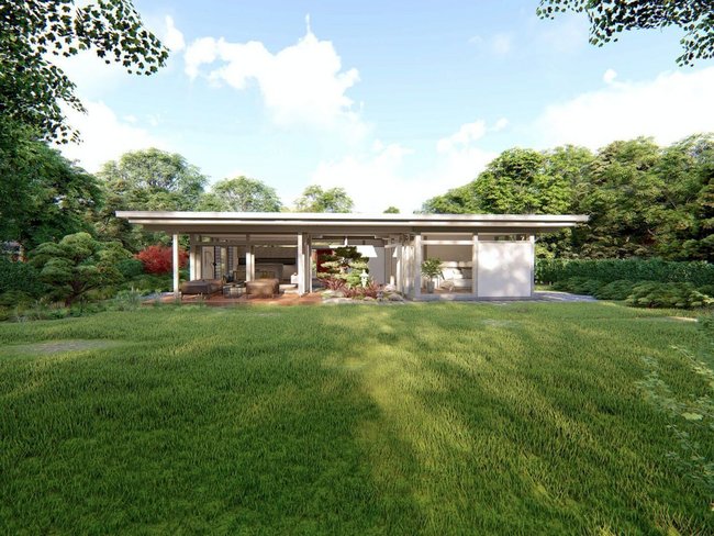Moderne Architektur eines Atriumhauses umgeben von Grünflächen