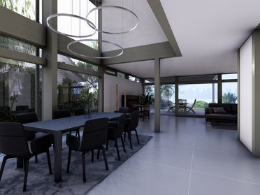Moderne Architektur eines Traumhauses mit großzügigem Wohnraum Innenansicht eines Architektenhauses mit Essbereich und Gartenblick