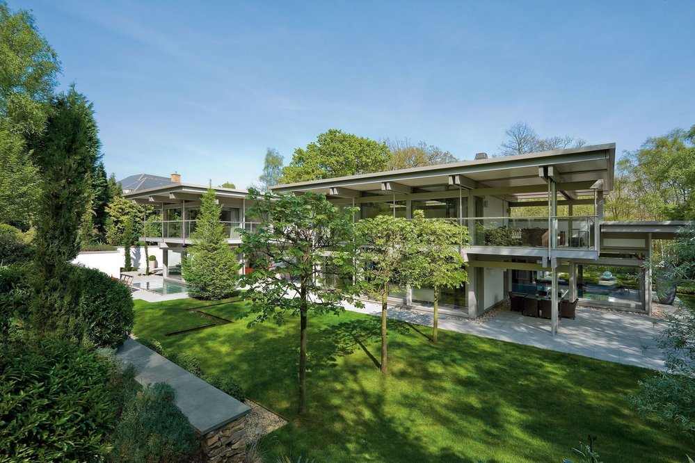 Modernes Flachdachtraumhaus mit klaren Linien Exklusives Lebensumfeld mit hochwertiger Architektur und Materialien