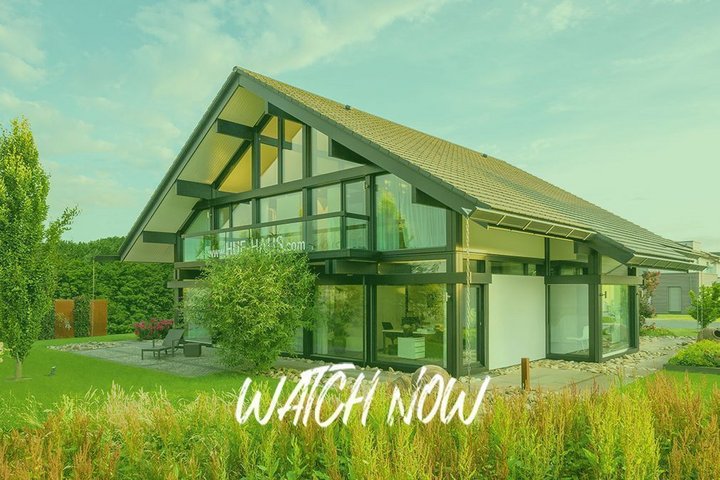 Jubiläumskalender 110 Jahre HUF HAUS Modernes HUF HAUS mit grüner Umgebung und Hinweis zum Ansehen